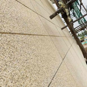 攀枝花 黄金麻花岗岩荔枝面外墙干挂石材效果示例