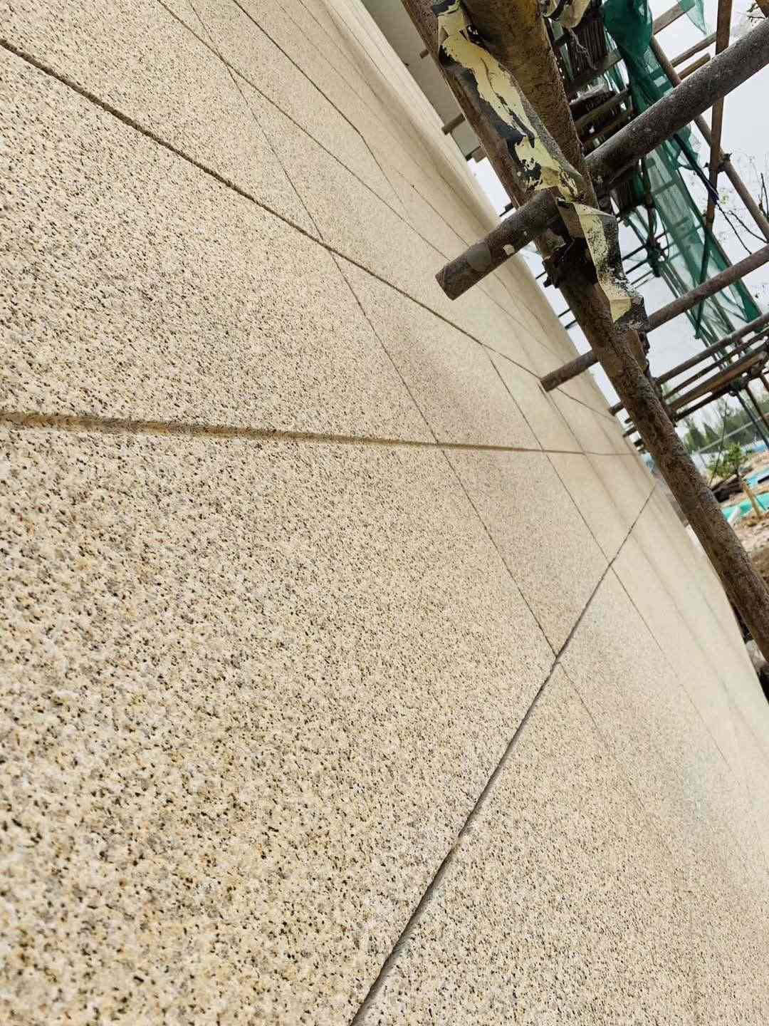 攀枝花 黄金麻花岗岩荔枝面外墙干挂石材效果示例